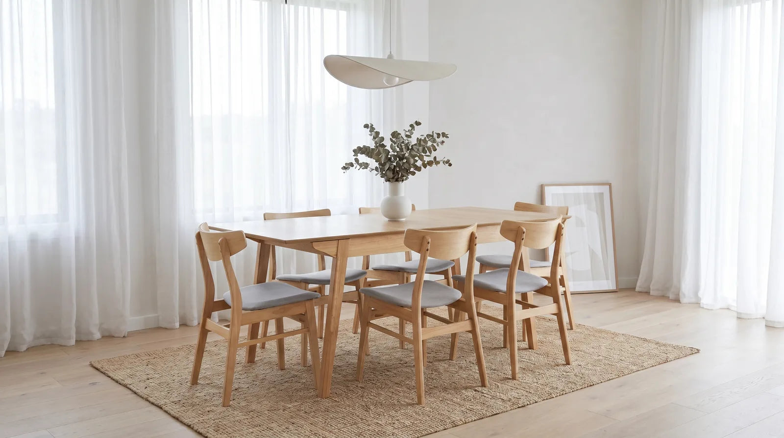 The Cusco Scandinavian oak dining range in a bright, airy dining room